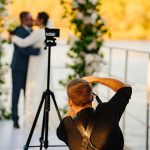 Photographer,Taking,Pictures,Of,The,Bride,And,Groom,At,The